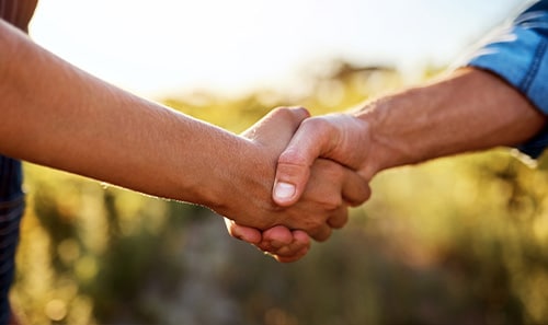 Two people shaking hands